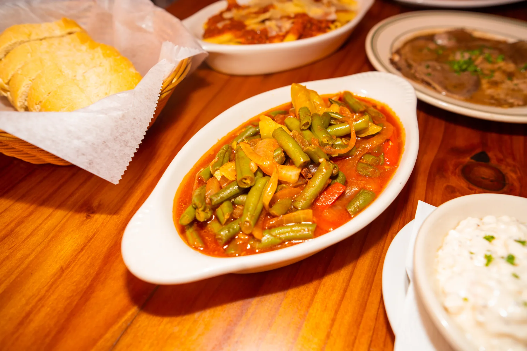 Basque green beans served with bread and cottage cheese